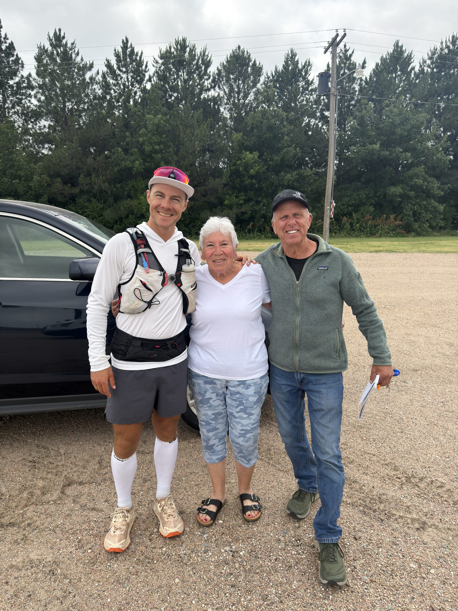 Collin and Kevin with a supporter along the route