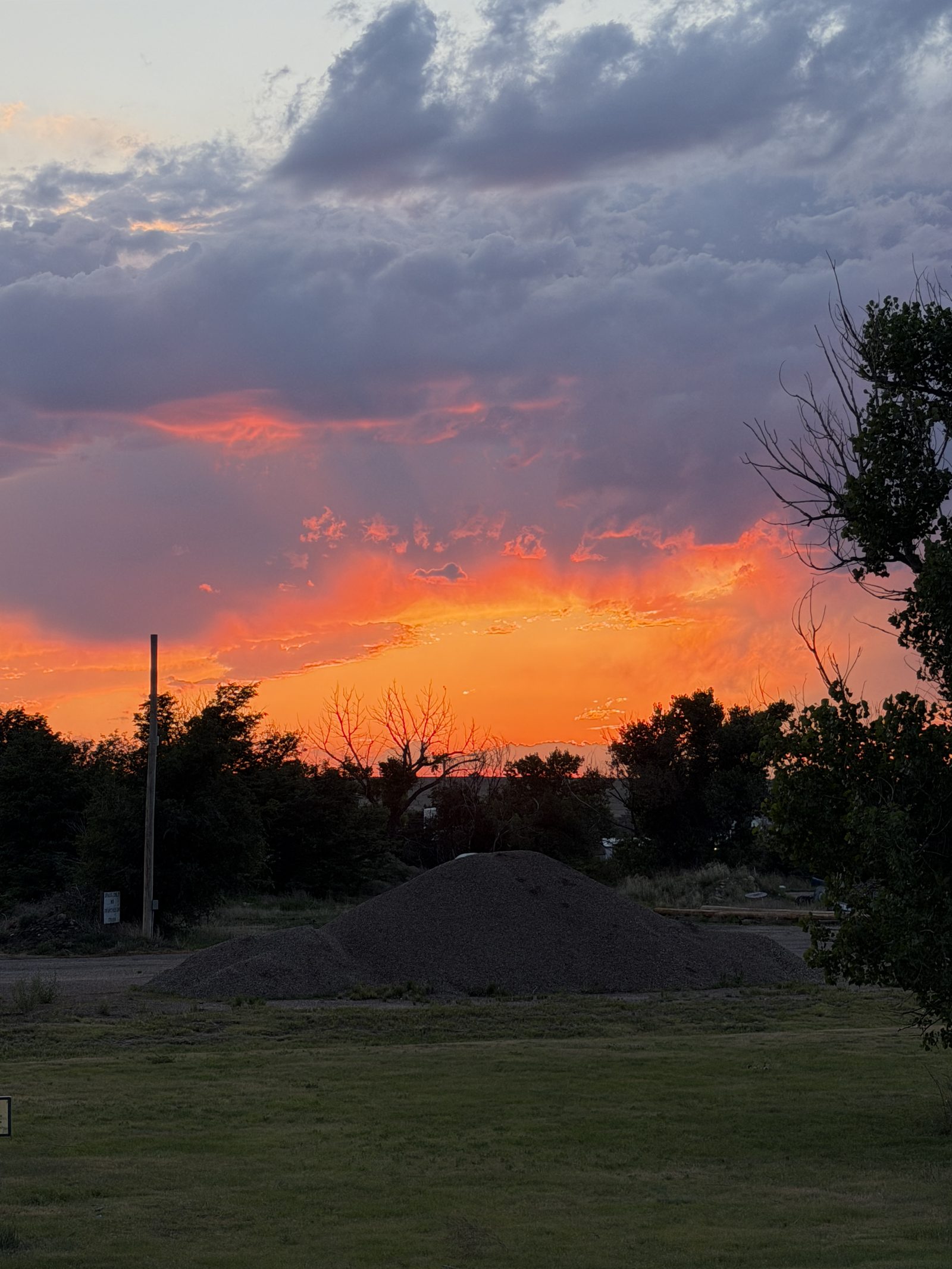 A fiery sunset over camp